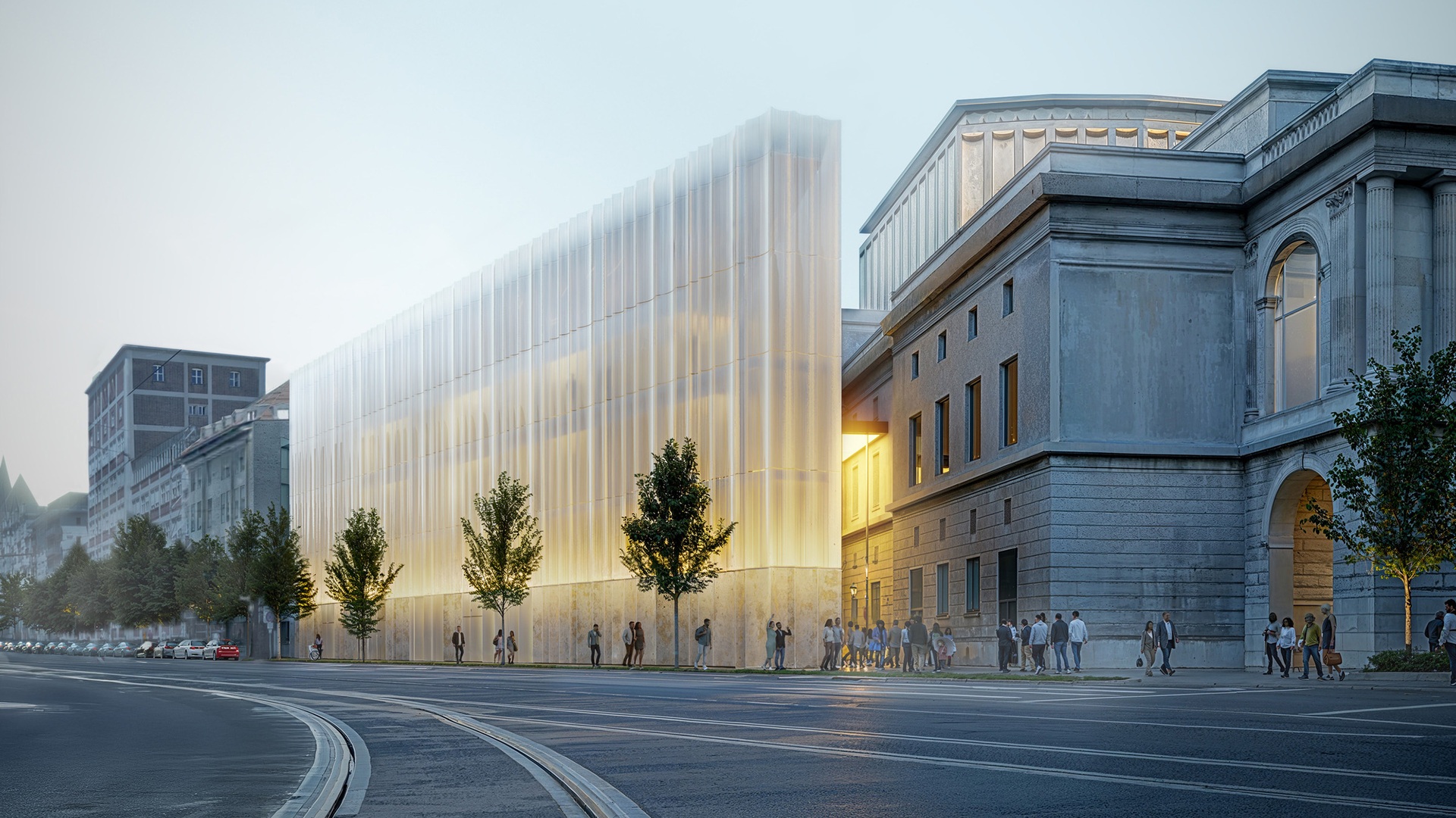 Hightech-Glasanlage mit beleuchtetem Innenraum neben einem historischen Steingebäude, die ein innovatives, nachhaltiges Design präsentiert.