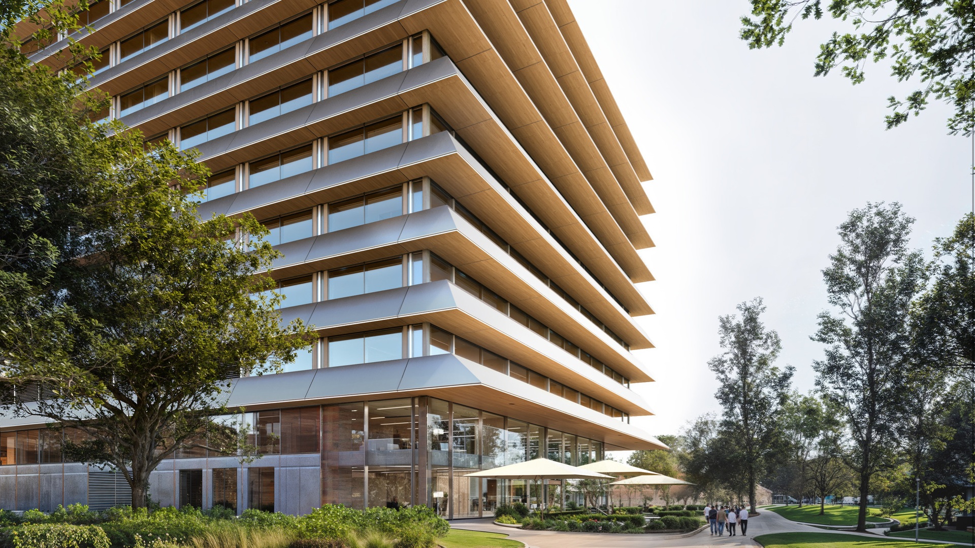 Innovatives, mehrstöckiges Gebäude mit weit ausladenden Dachvorsprüngen, nachhaltiger Landschaftsgestaltung und Wegen, das für die Spitzenforschung konzipiert wurde.